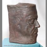 Der Bücherfreund / Buchstütze-Portrait; Bronze, lebensgroß, 2008, im Privatbesitz, auf Bestellung mit dem Antlitz der Person Ihrer Wahl